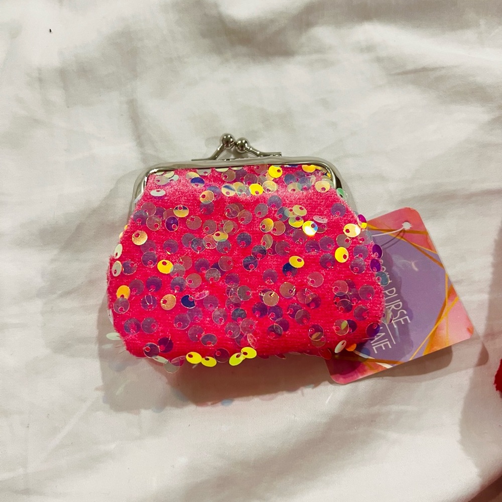 4 Glitter coin purses for one price. New
